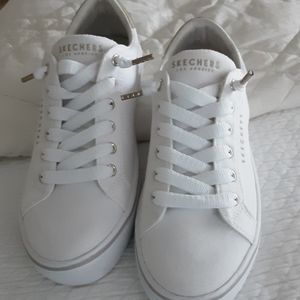 Sketches white canvas with gold accents